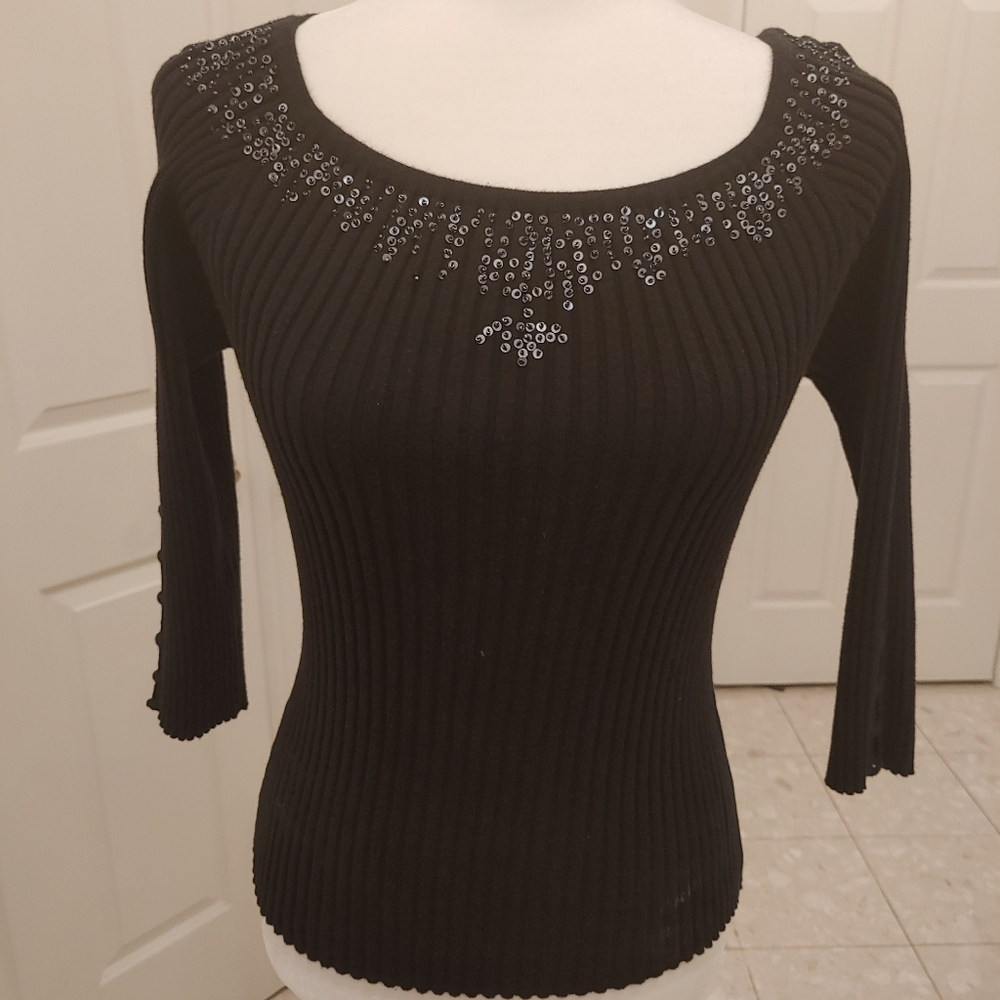 Black top with sequins accenting
